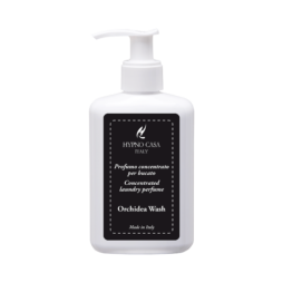 Un flacone bianco con dosatore, recante l'etichetta "Profuma Bucato Orchidea Wash - Hypno - 200 ml", presenta una scritta in bianco e nero che risalta su uno sfondo scuro.