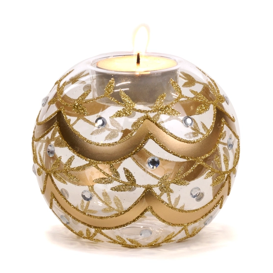 Porta Tea Light – Goodwill Natale Un portacandele sferico in vetro di Goodwill, decorato con motivi dorati e strass, sorregge elegantemente una Porta Tea Light accesa - Goodwill.
