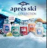Summit Stargazin – Giara Media – Yankee Candle 250 Punti Cinque candele profumate colorate della collezione Après Ski sono esposte sulla neve con uno sfondo di montagna, sotto un testo che recita "NEW après ski COLLECTION". Un'etichetta indica che sono disponibili in negozio e online.
