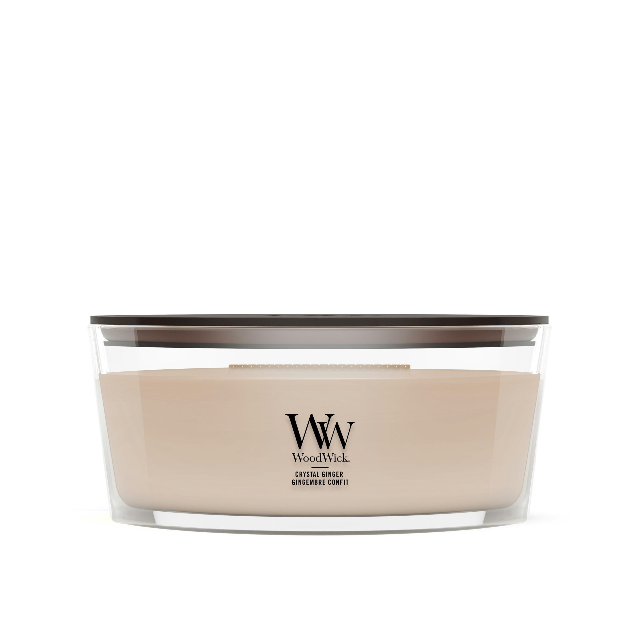 Crystal Ginger – Ellipse – Woodwick Ellipse Una candela Crystal Ginger WoodWick color crema, contenuta in un elegante recipiente di vetro di forma ellittica con coperchio nero.